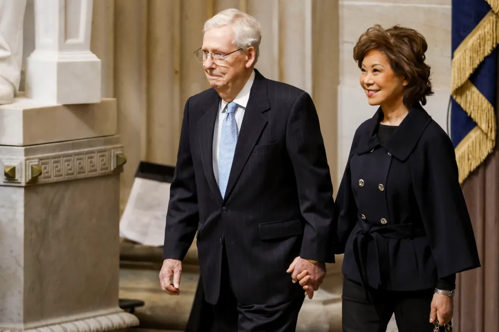 Senator Mitch McConnell and Elaine Chao arrive at the inauguration of President-elect Donald Trump.