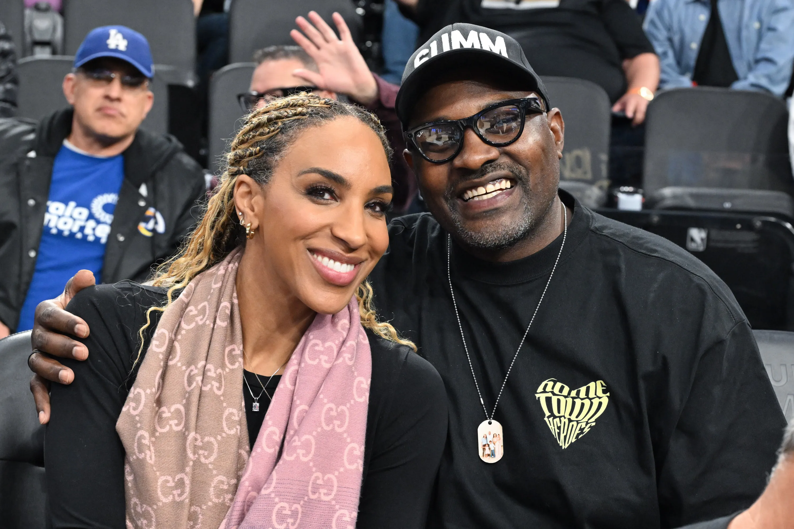 Annemarie Wiley and Marcellus Wiley at a basketball game.