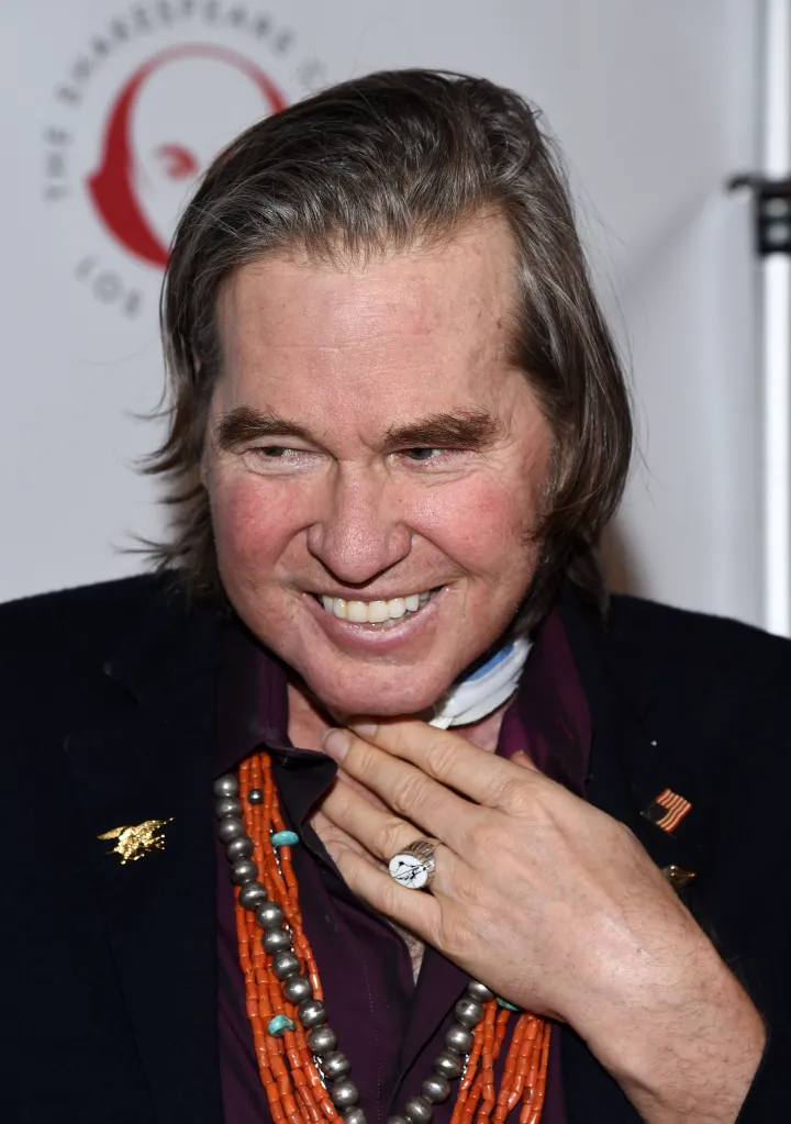 Val Kilmer smiling.