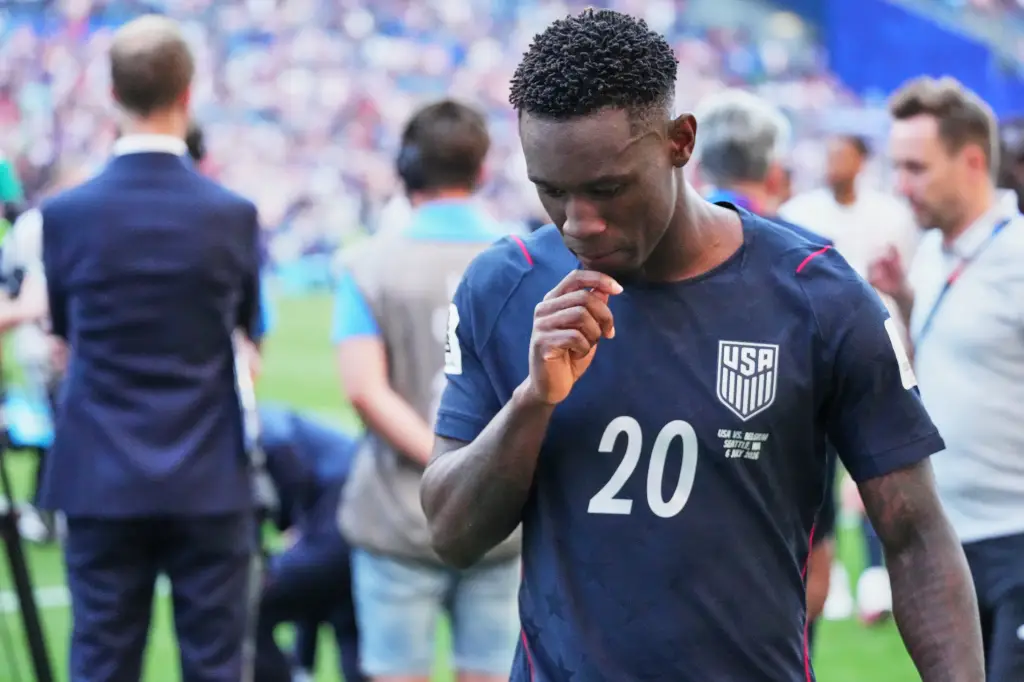 Folarin Balogun of the United States walking off the field after losing to Belgium.