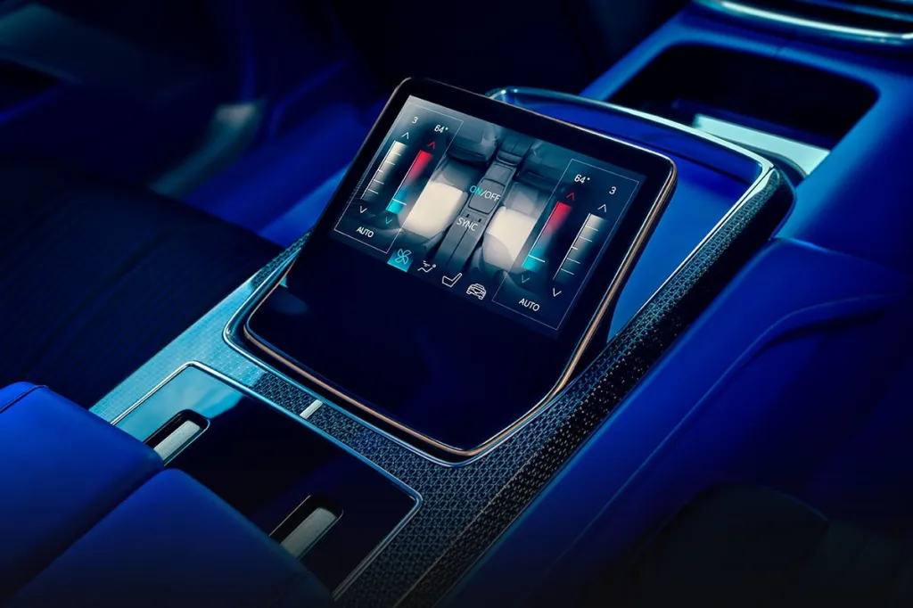 Interior view of a Cadillac CELESTIQ showing the center console screen displaying climate controls.