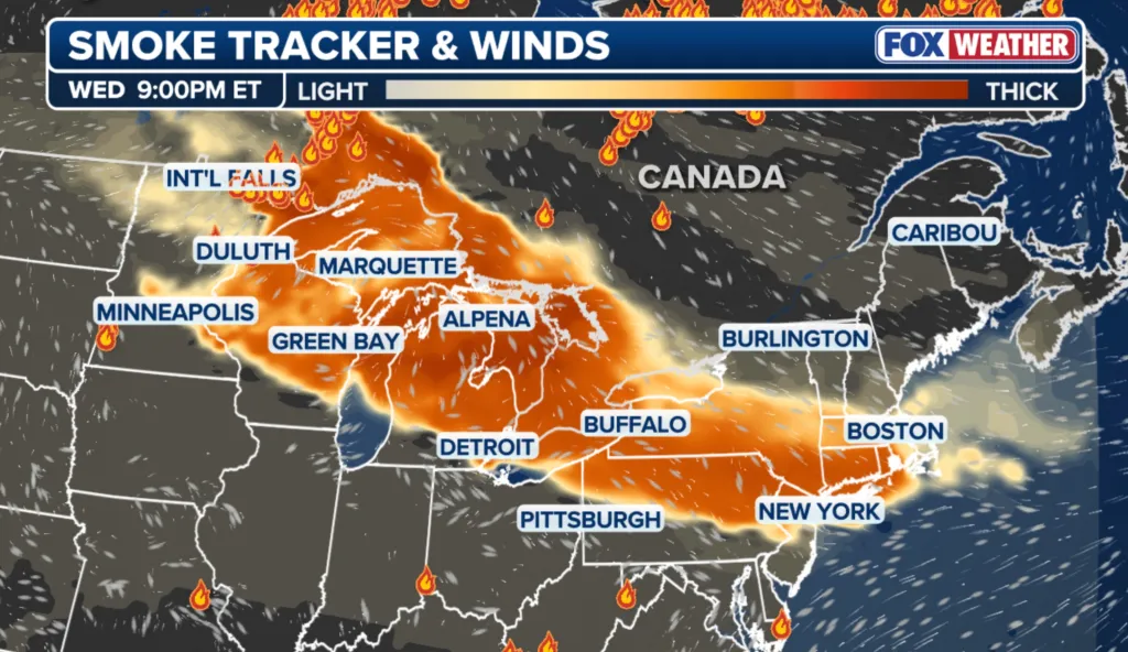 Illustration of a smoke tracker and winds map showing dense smoke from Canadian wildfires affecting the Great Lakes region and northeastern US.