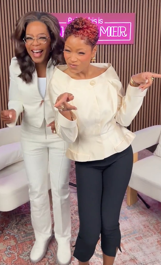 Oprah Winfrey and Keke Palmer dancing in a studio.