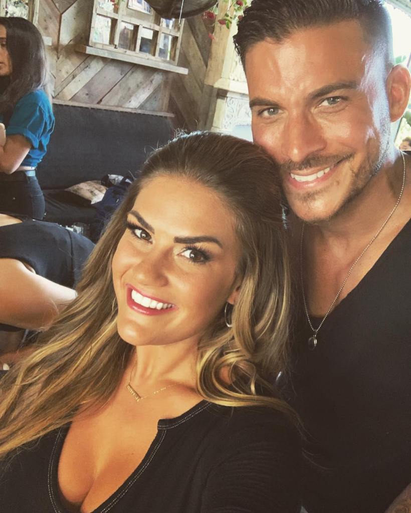 Jax Taylor and Brittany Cartwright smiling at the camera.