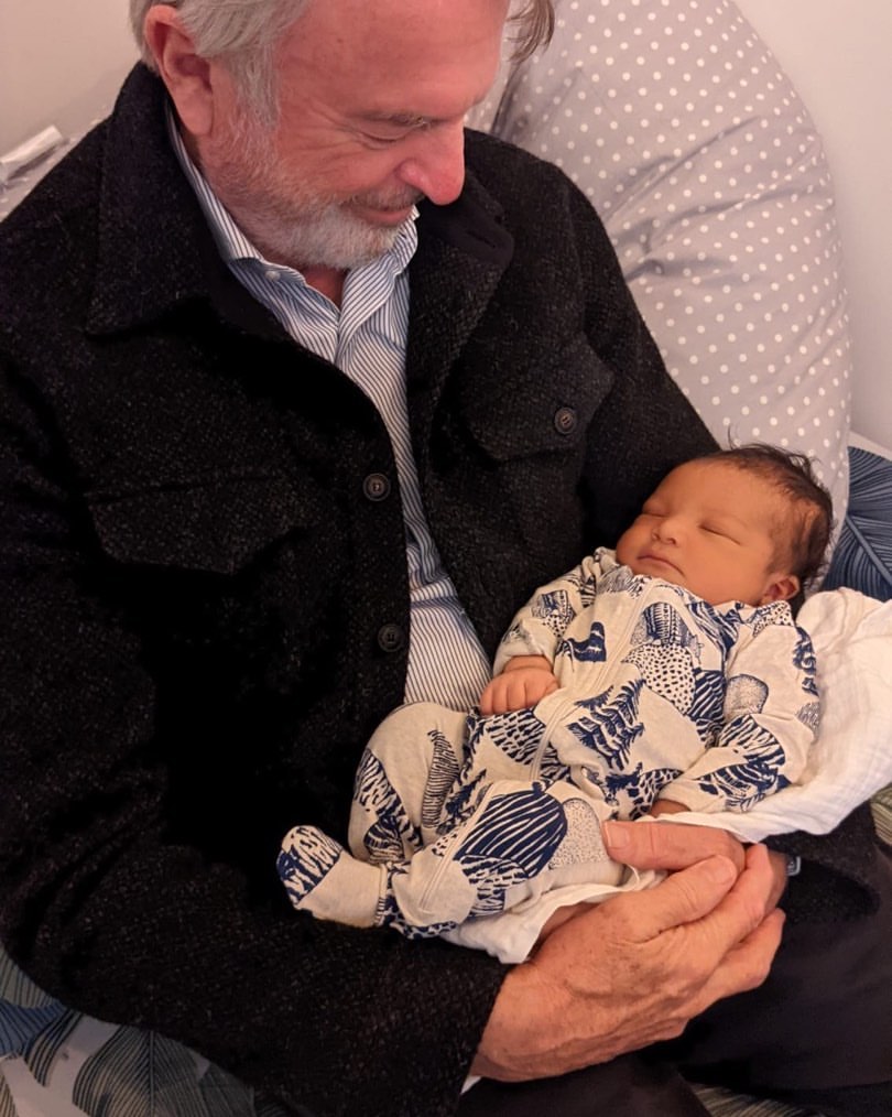 Sam Neill with his grandson 