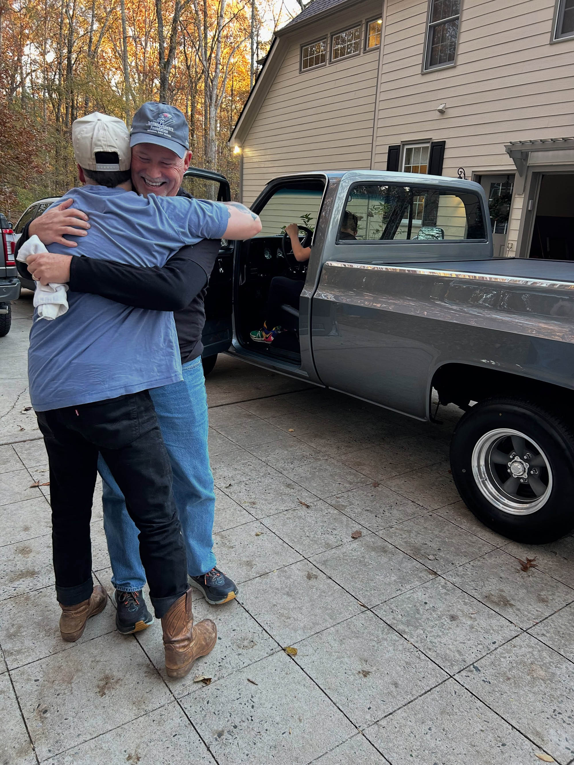 Zach King hugging his father John King.