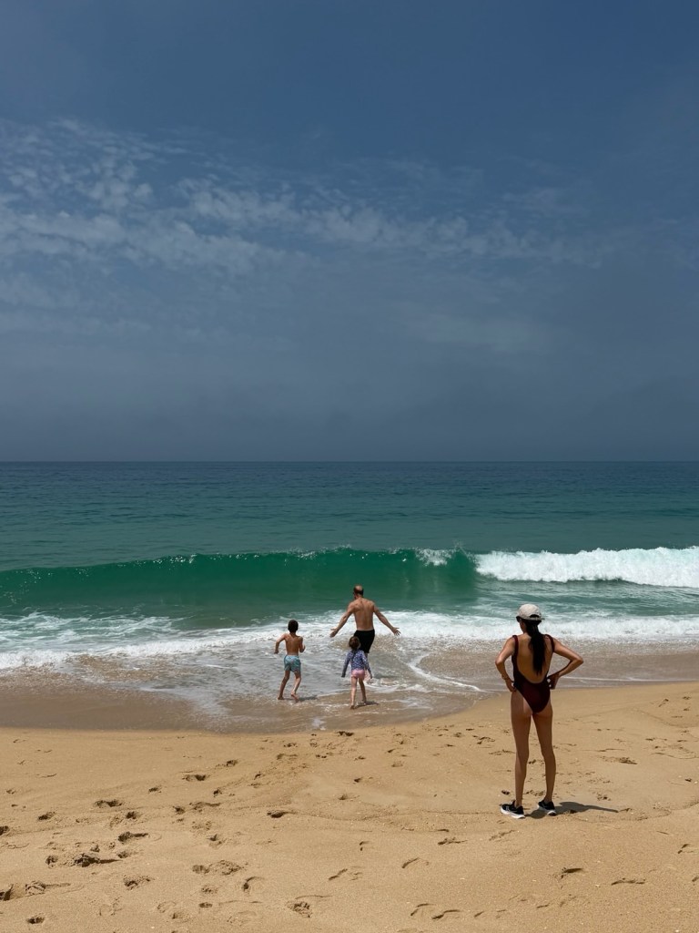 Family on summer vacation at the beach.