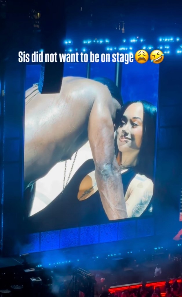 Usher onstage reacting to Gabrielle Cheyenne, who doesn't want to be there.