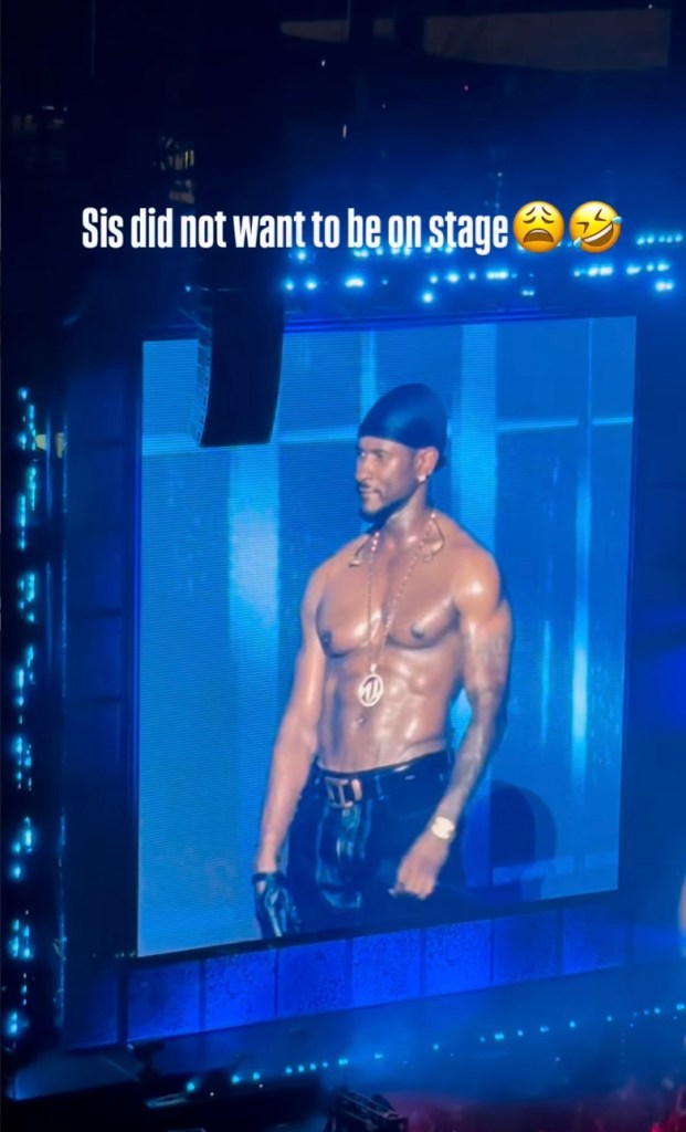 Usher on stage reacting to Gabrielle Cheyenne, who appears to be uncomfortable.