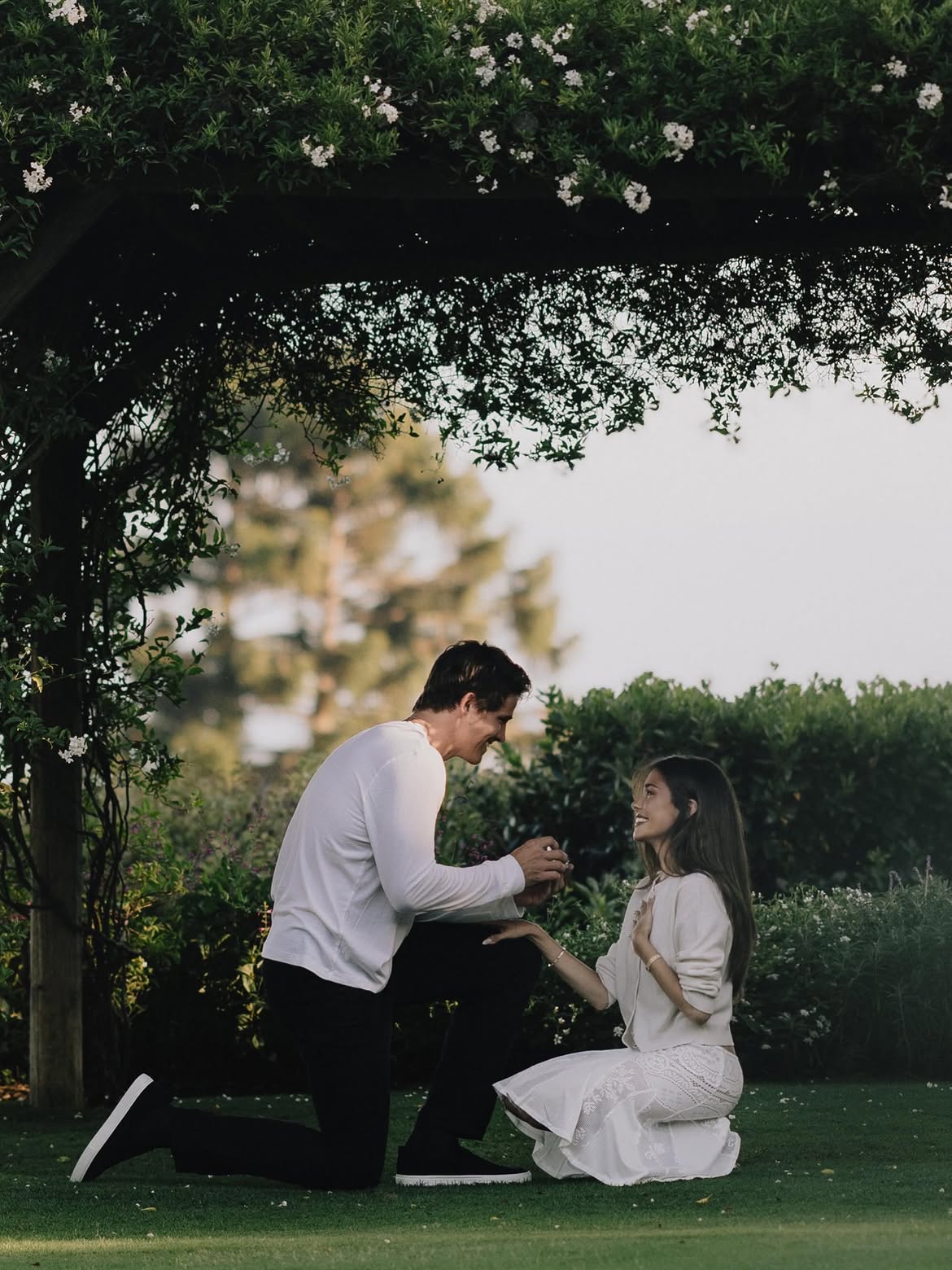 Madison Beer reacts as Justin Herbert proposes to her.