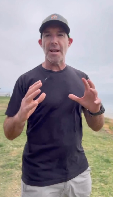 Steve Hubbard (namasteveyoga) talking and gesturing with both hands.