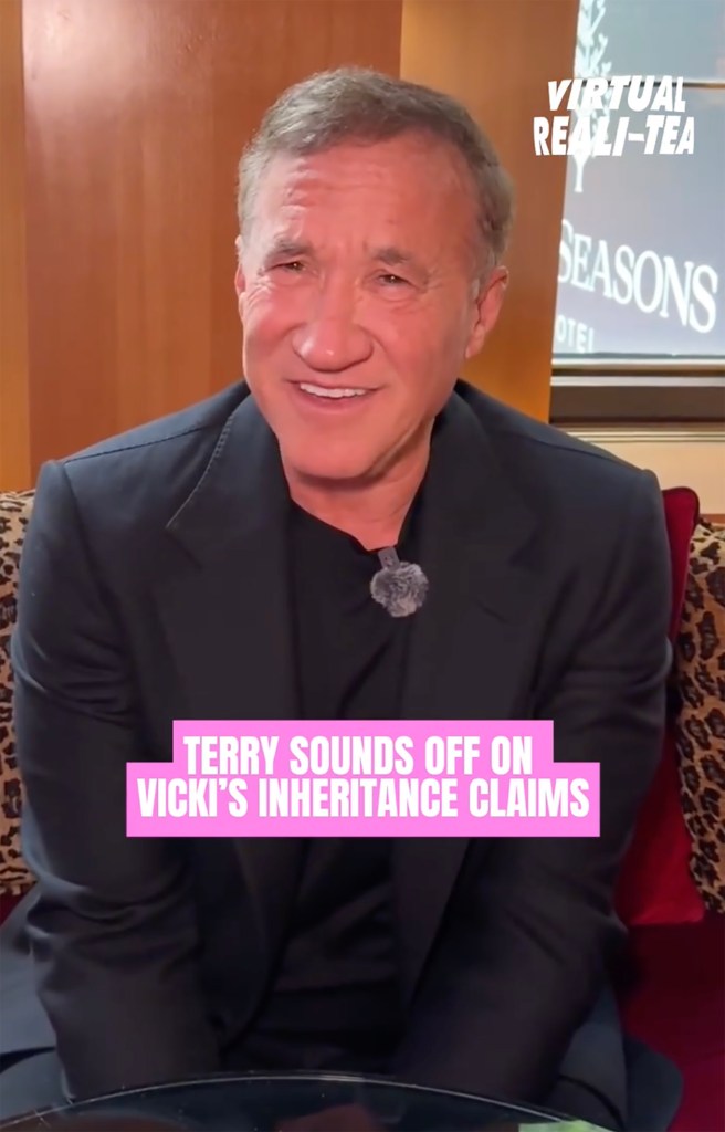 A smiling Terry Dubrow, wearing a black jacket and T-shirt, with a white microphone clipped to his shirt.