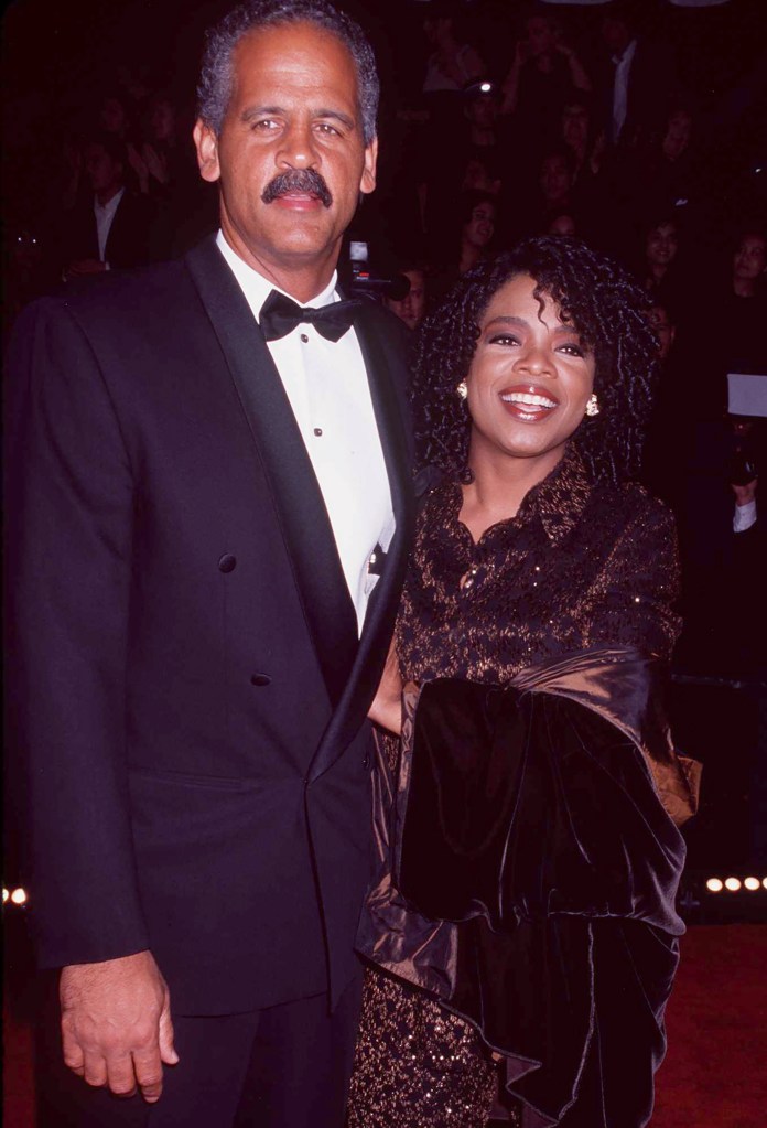 Oprah Winfrey and Stedman Graham posing together at the People's Choice Awards.