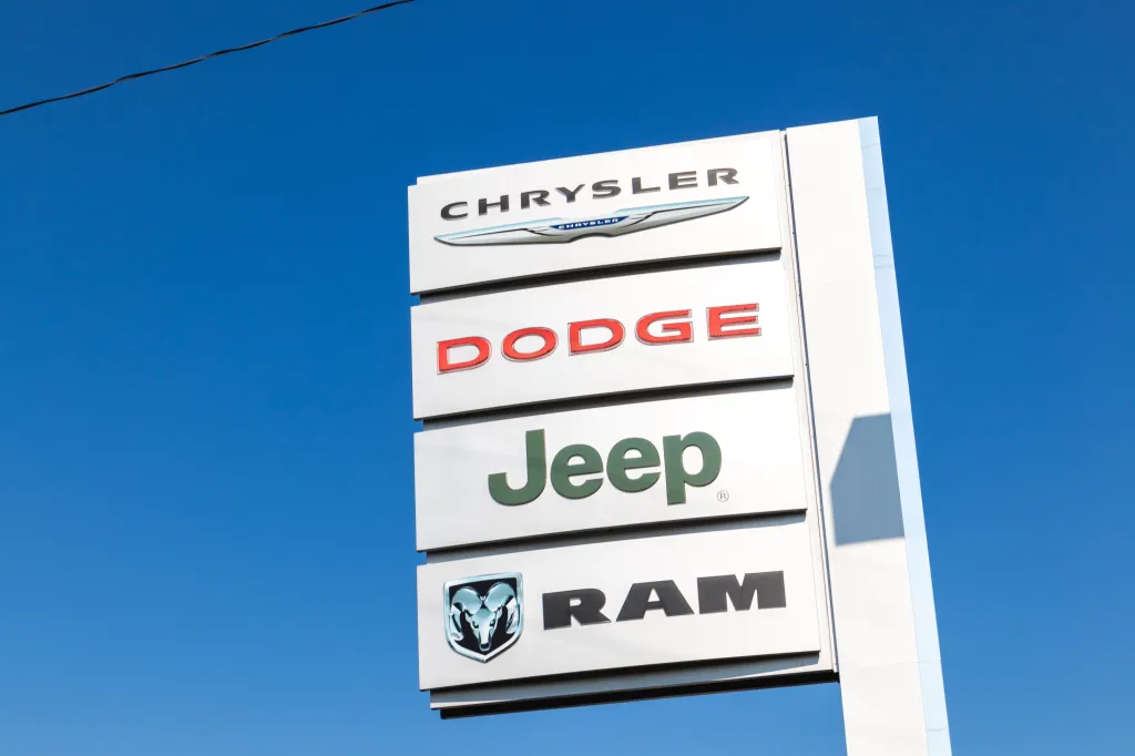 Sign for a Chrysler, Dodge, Jeep, and Ram dealership.