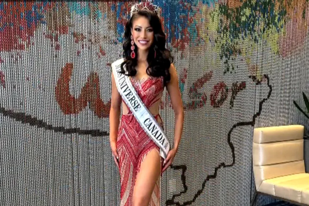 Miss Universe Canada 2023, Madison Kvaltin, in a red gown and tiara.