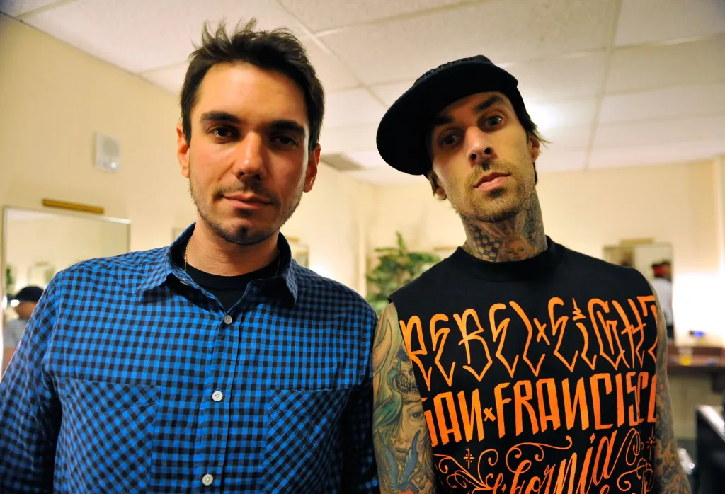DJ AM and Travis Barker at the launch of "DJ Hero."