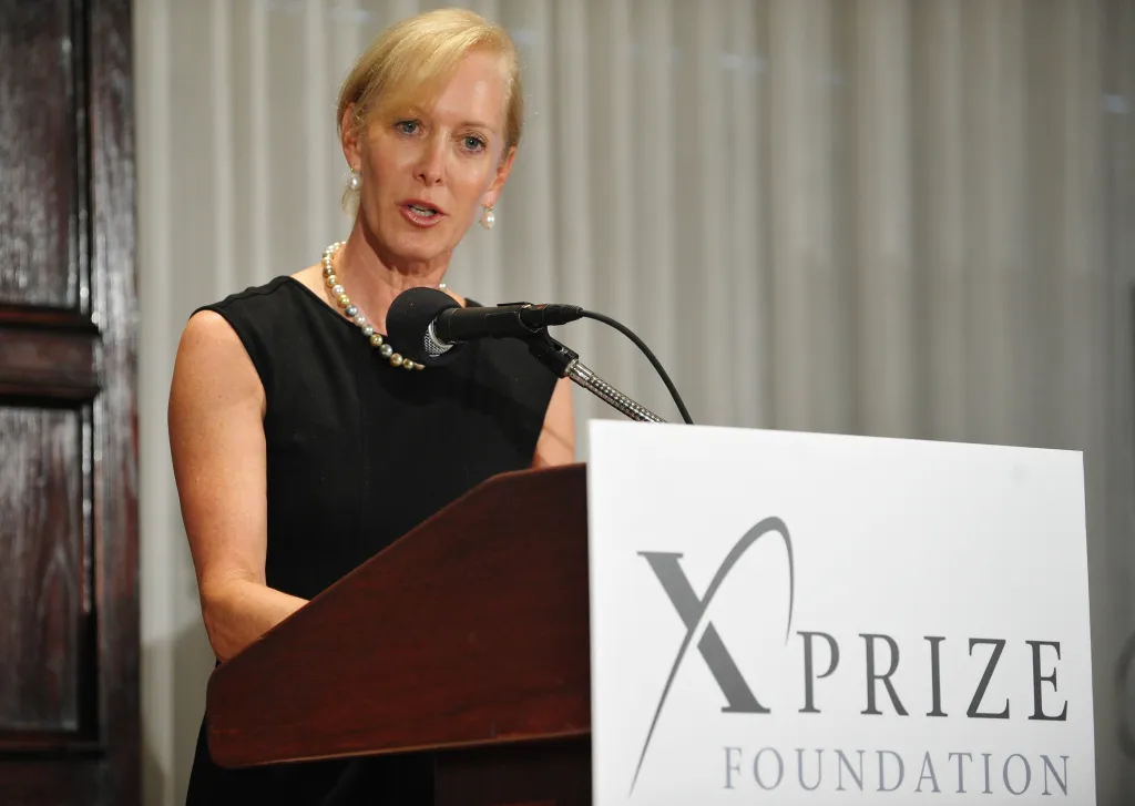 Wendy Schmidt speaking at a press conference for the "Oil Cleanup X CHALLENGE" competition.