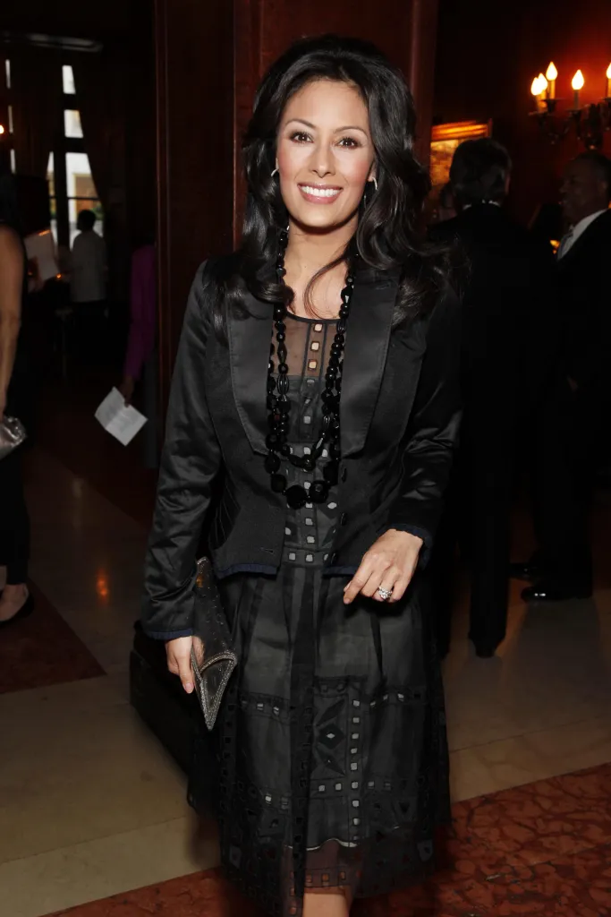 Liz Cho smiling and posing at an event.