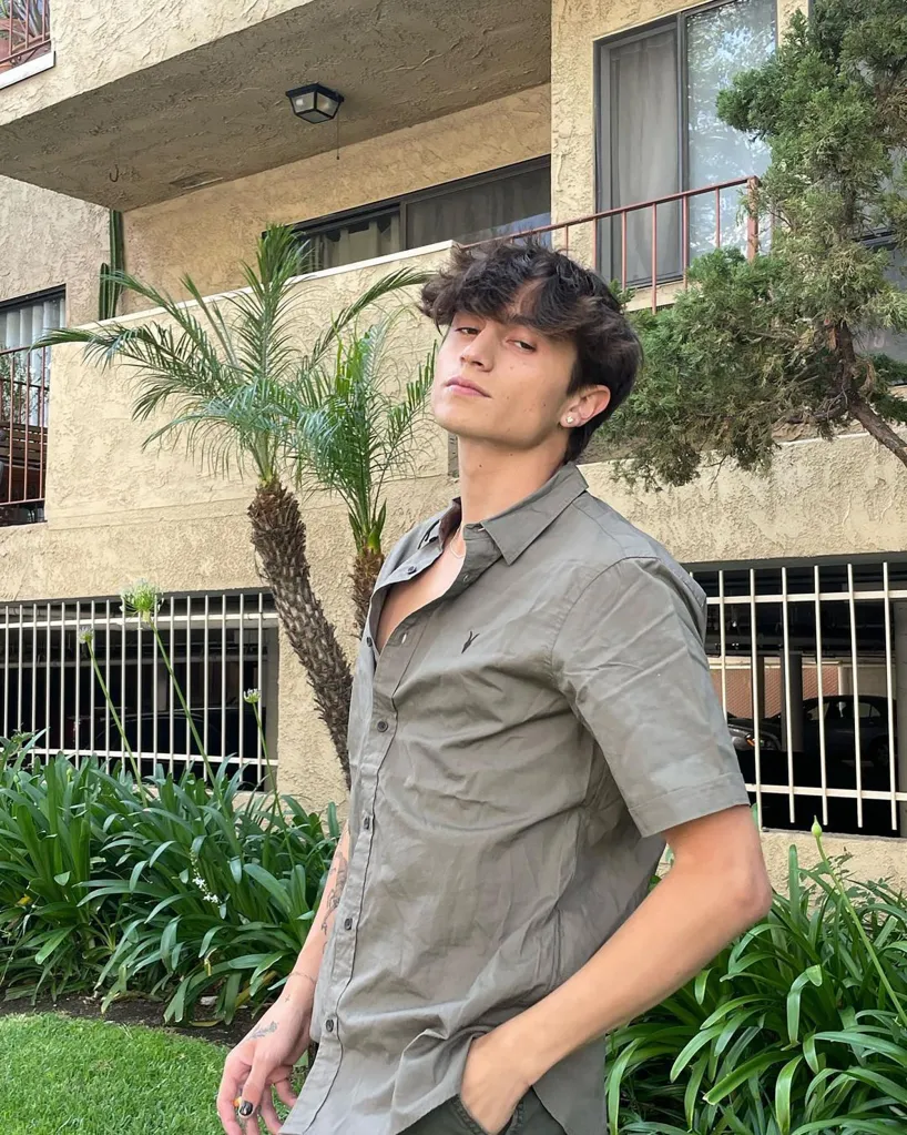 Cooper Noriega in a short-sleeved collared shirt.