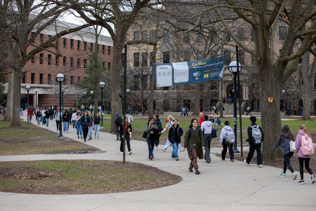 University of Michigan students walk on the UM campus on Thursday, April 3, 2025, in Ann Arbor,