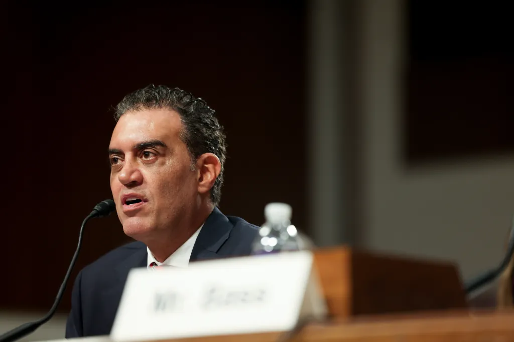 Pentagon AI chief Emil Michael blasted Dean Ball as a "supreme village idiot."