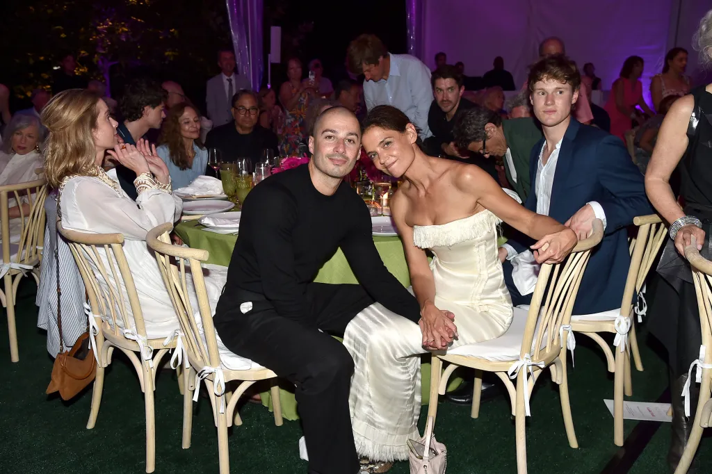 Jason Bard Yarmosky and Katie Holmes holding hands at the Guild Hall Summer Gala 2026.