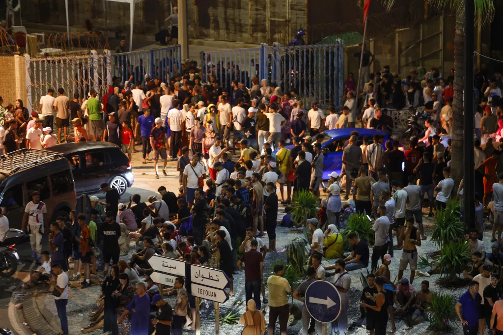 People gather near the Bab Sebta border between Morocco and Spain.