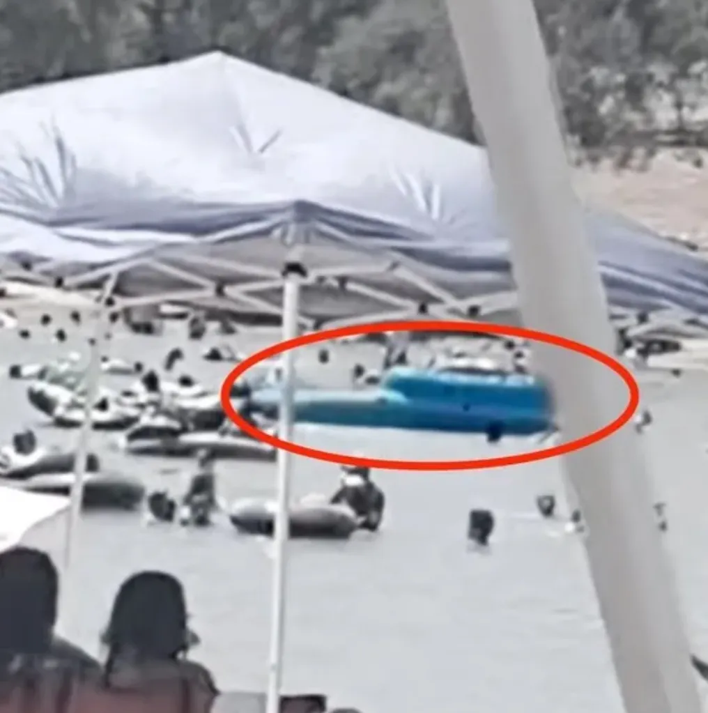A blue inflatable floating in water at Don Pedro Reservoir.