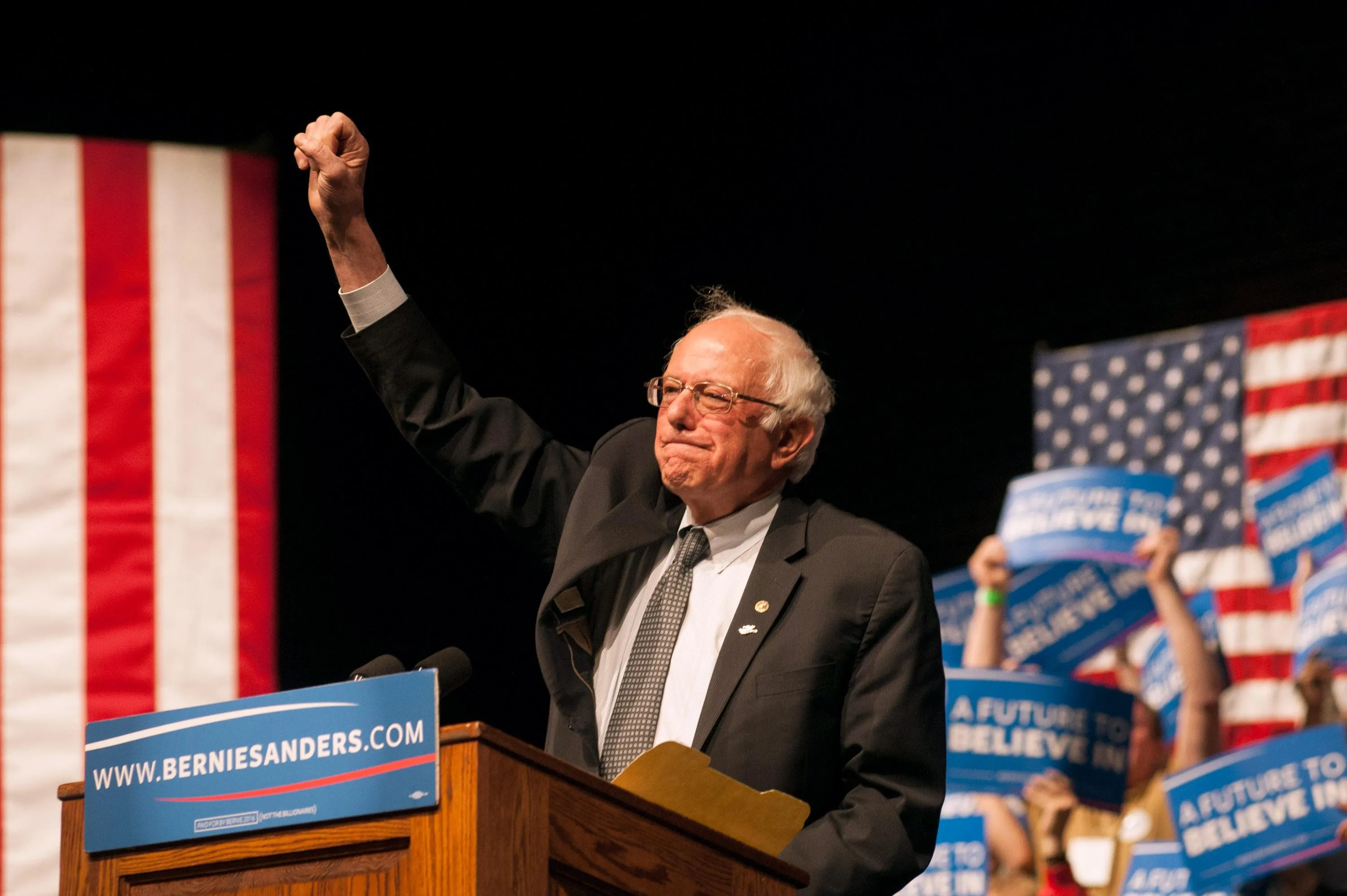 Bernie Sanders raising a fist during a rallly