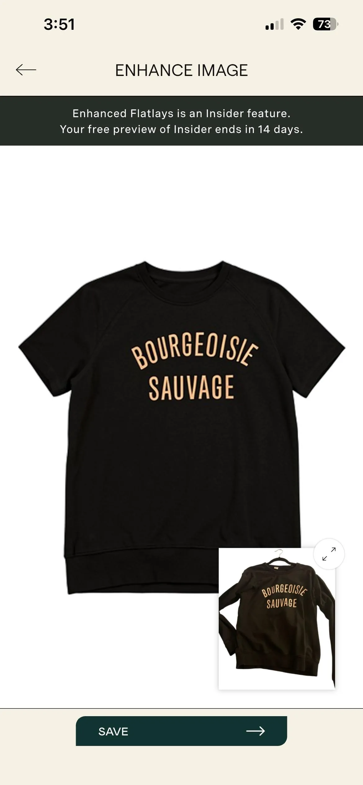 A photo of a black t-shirt with the phrase BOURGEOISIE SAUVAGE written in yellow print. A photo of a black t-shirt with the phrase BOURGEOISIE SAUVAGE written in yellow print.