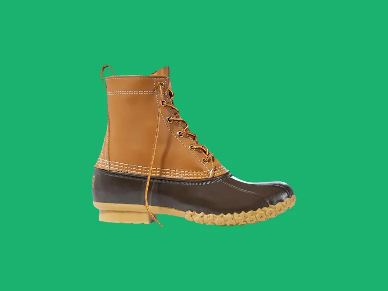  L.L. Bean Duck Boot on green backdrop.