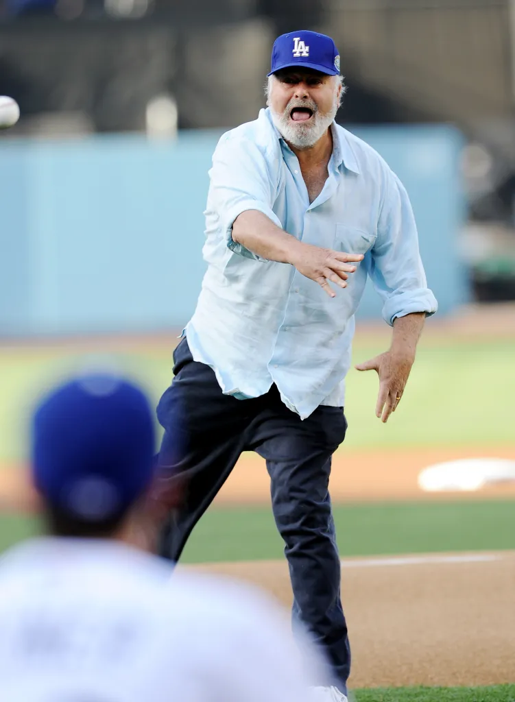 Actor Rob Reiner throwing the first pitch at a Dodgers game.