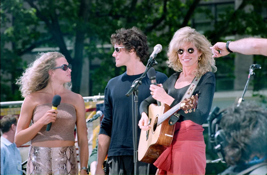 Carly Simon performs with her daughter Lucy Taylor and son Ben Taylor during an appearance on Good Morning America.