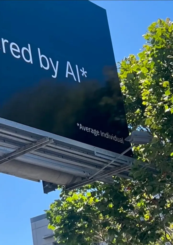 A billboard for ChatTJB.org with the text "powered by AI*" and "*Average Individual" in San Francisco.