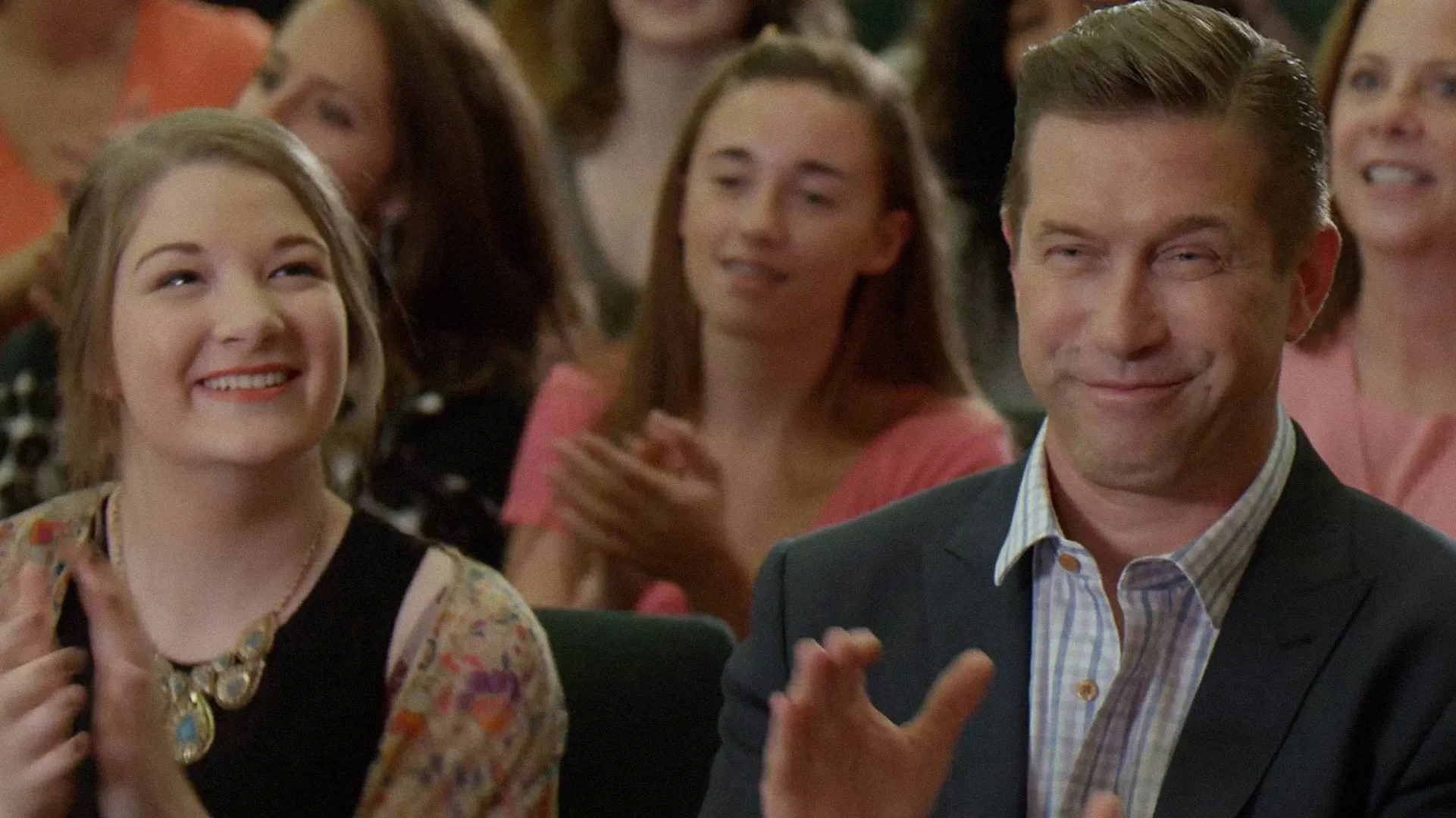 Blythe Baird and Stephen Baldwin clapping in The Unmiracle.