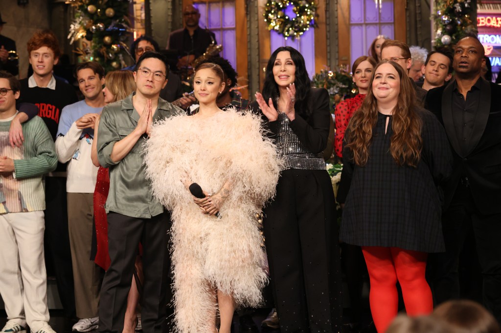 Bowen Yang, Ariana Grande, Cher, and Aidy Bryant on stage during "Goodnights & Credits" on Saturday Night Live.