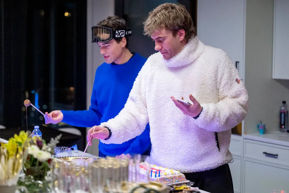 Brooks Marks and Charlie Zakkour at a fondue party.