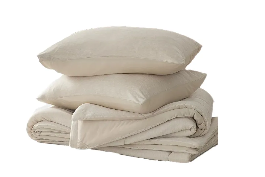 A stack of pillows and blankets