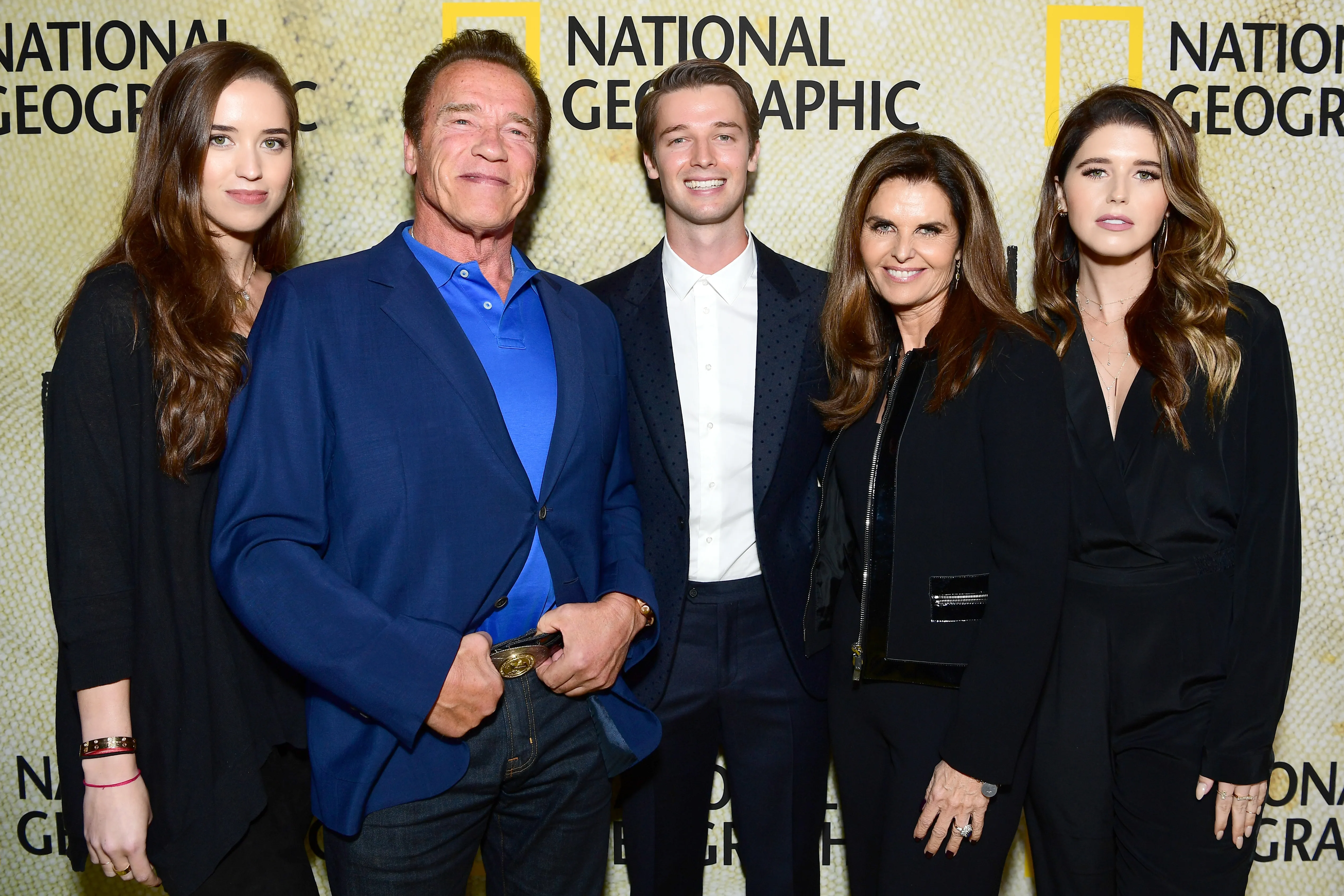 Christina Schwarzenegger, Arnold Schwarzenegger, Patrick Schwarzenegger, Maria Shriver, and Katherine Schwarzenegger pose together at "The Long Road Home" premiere.