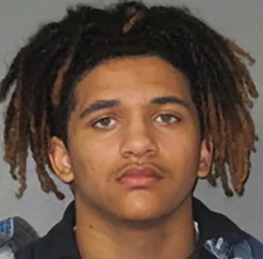 Booking photo of Desmond Carter, 21.