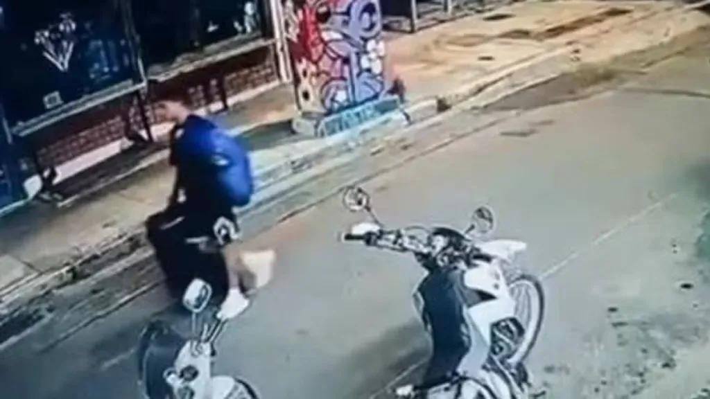 CCTV footage of Sharif Ahmadzai dragging a black suitcase.