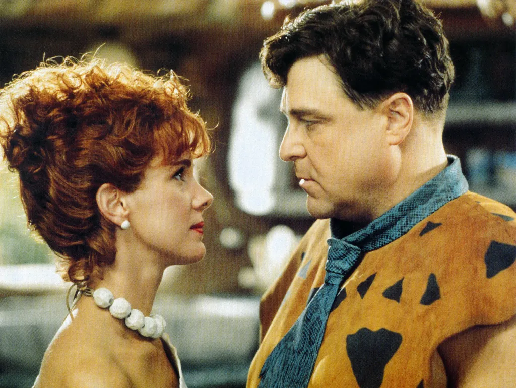 Elizabeth Perkins and John Goodman from the movie The Flintstones.