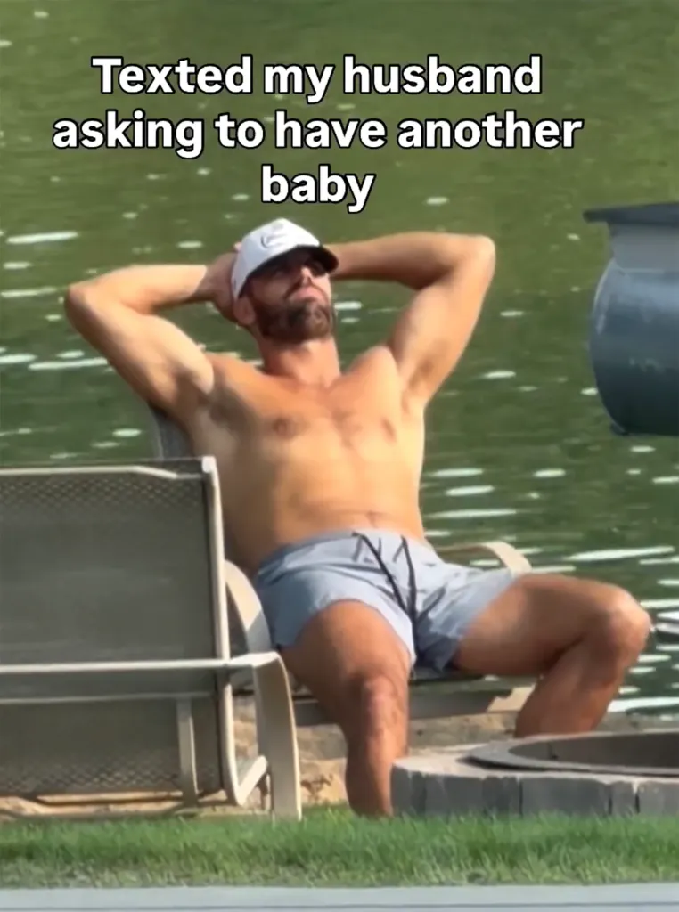 A man sits shirtless in a chair by the water with text "Texted my husband asking to have another baby"