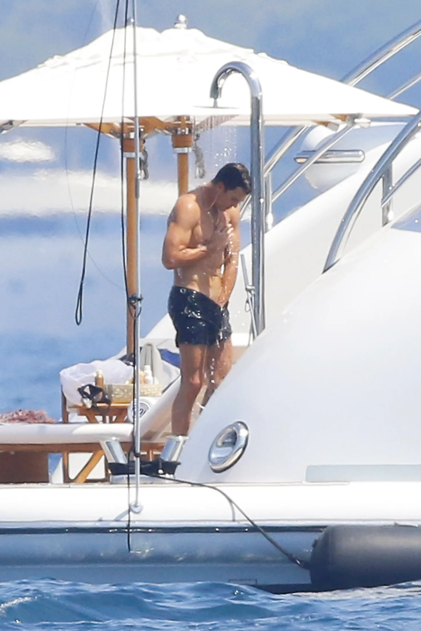 Tom Brady showering on a yacht in the South of France.