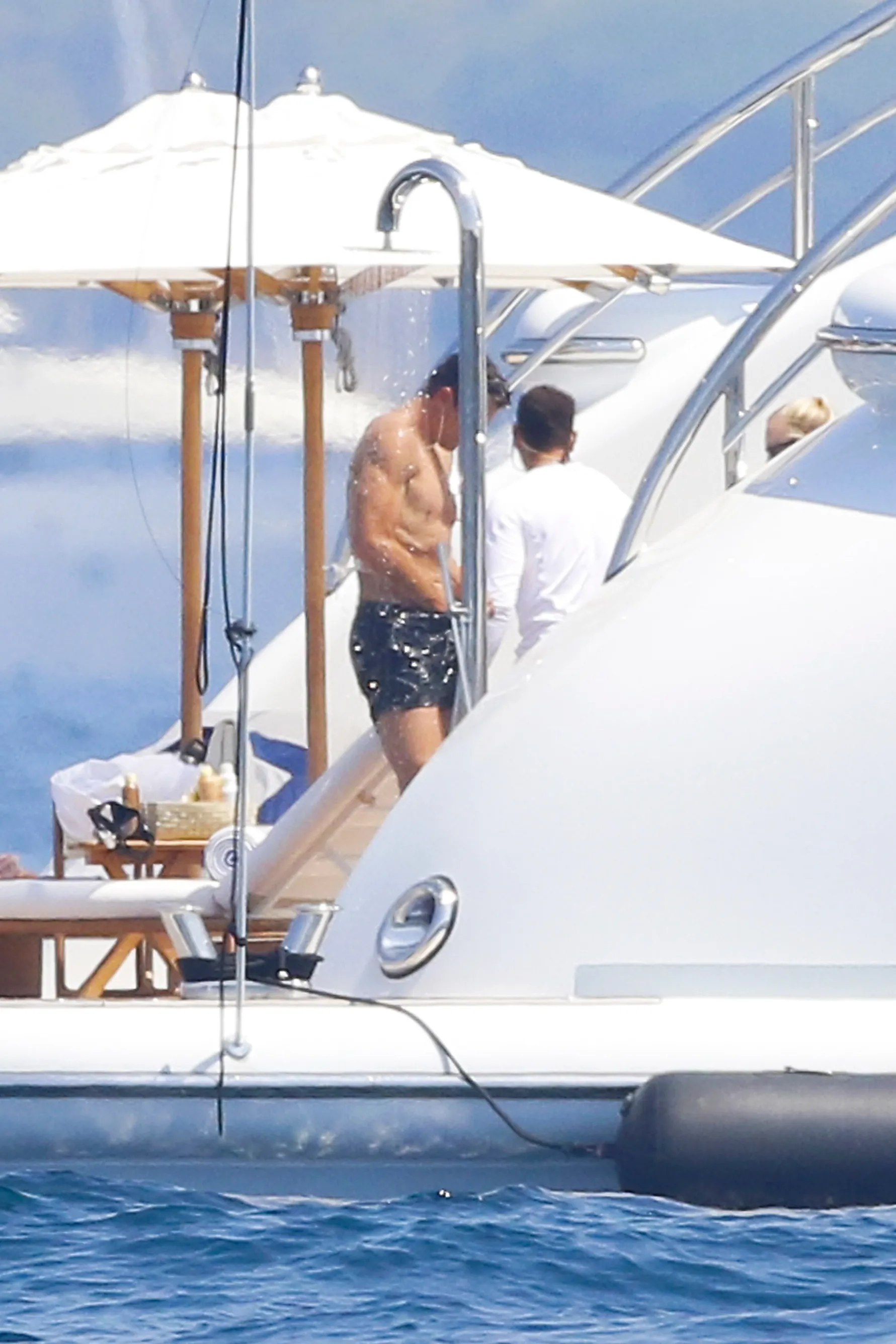 Tom Brady showering on a yacht in the South of France.