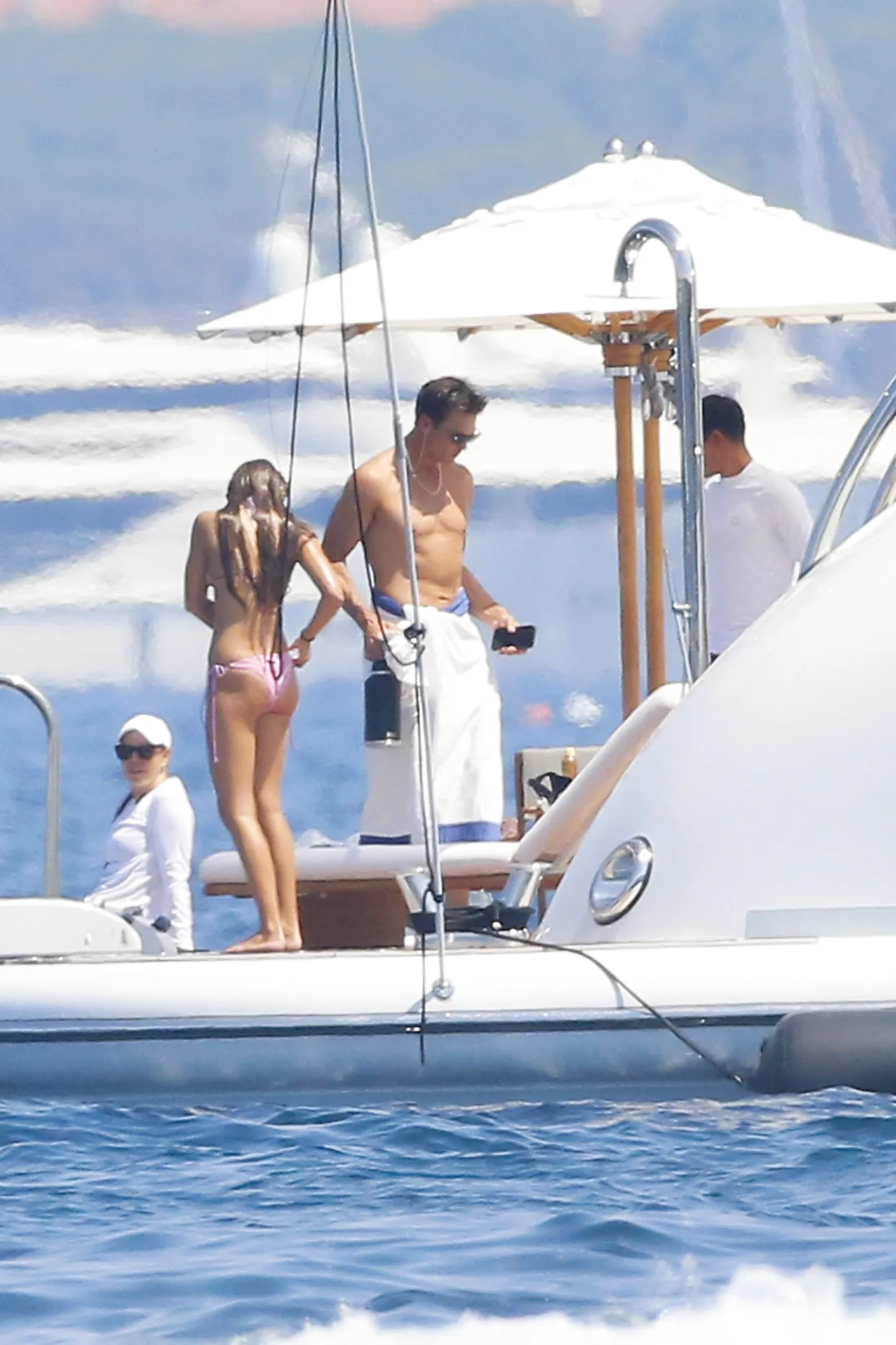 Tom Brady and a blonde woman on a yacht in the South of France.