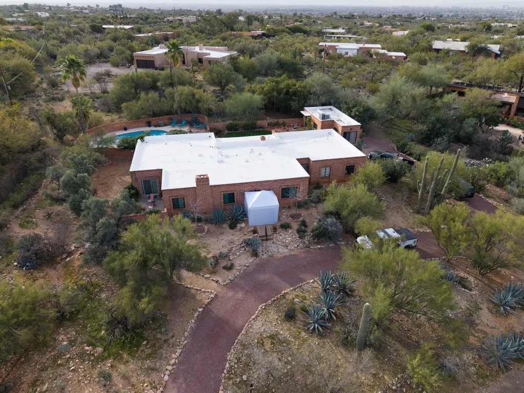 Aerial view of Nancy Guthrie's home in Tucson, Arizona, with an FBI tent outside.