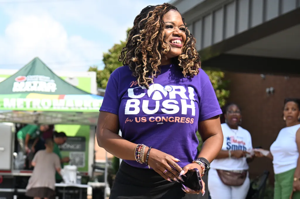 Former U.S. Rep. Cori Bush, D-Mo., greets voters.