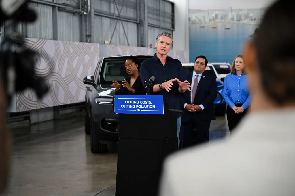 Governor Gavin Newsom speaking at a press conference in Oakland about clean energy.