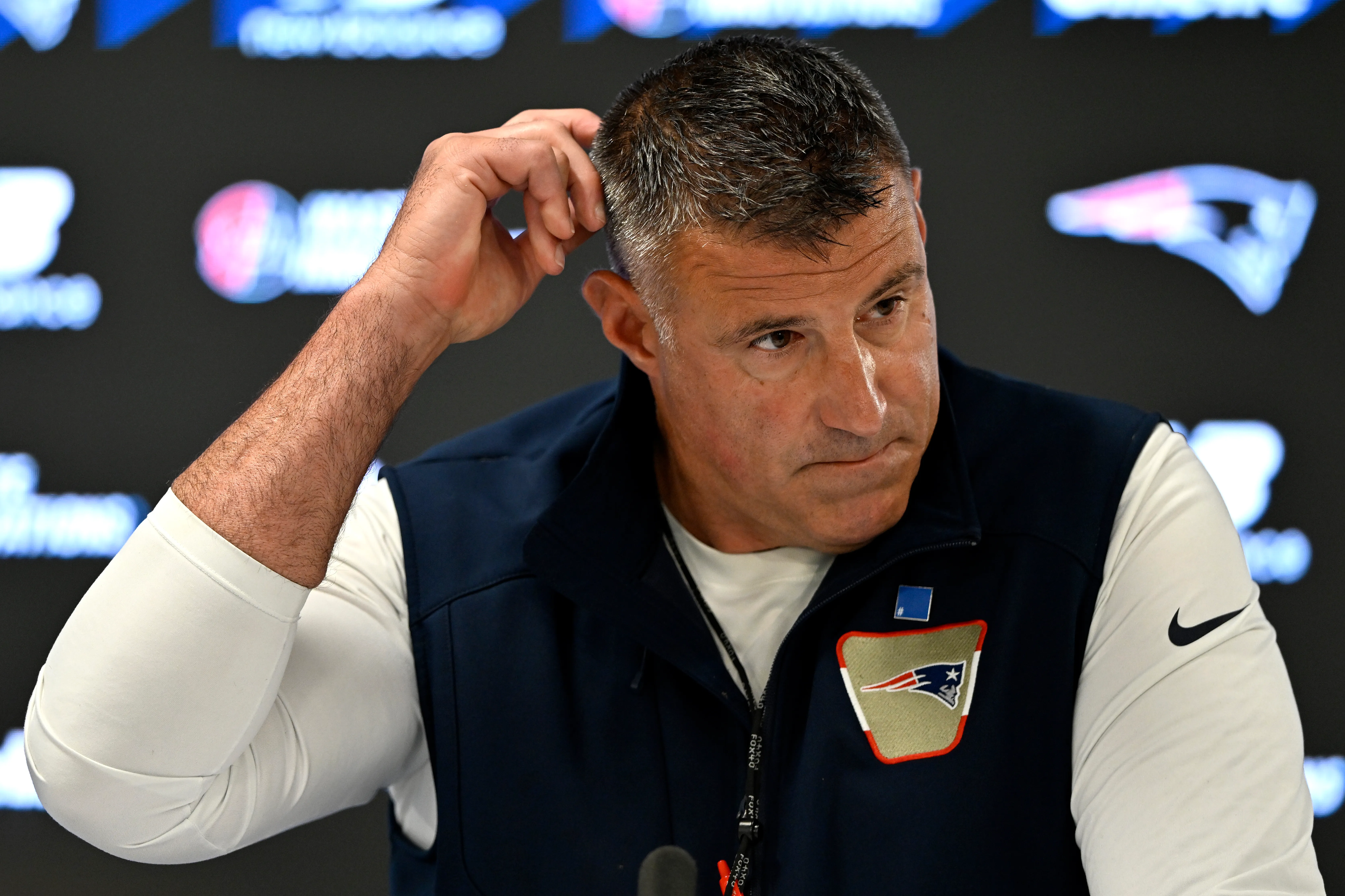 New England Patriots Head Coach Mike Vrabel speaking at a press conference.